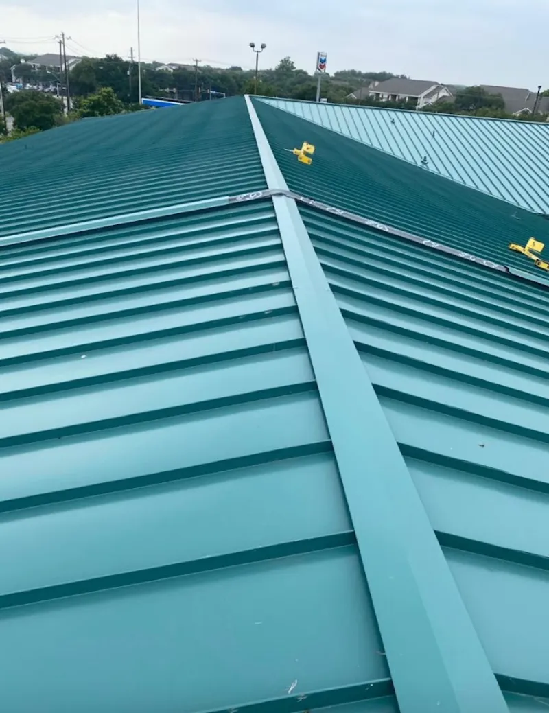 Green commercial metal roof ridge and valley for Metal Roof Repair in Sand Lake