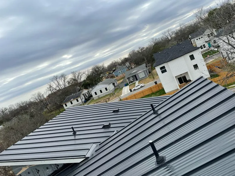 Standing seam metal roof panels with vents for Skylight Repair in Sand Lake